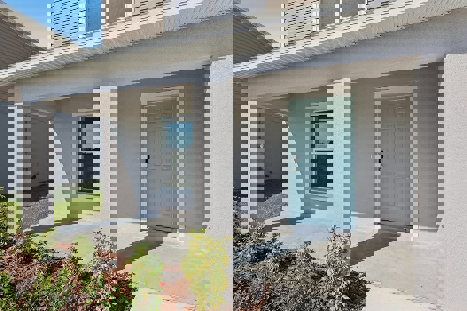 A house with a blue door.