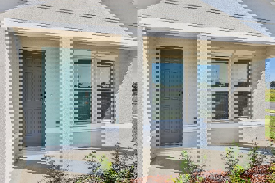 A house with a blue door.