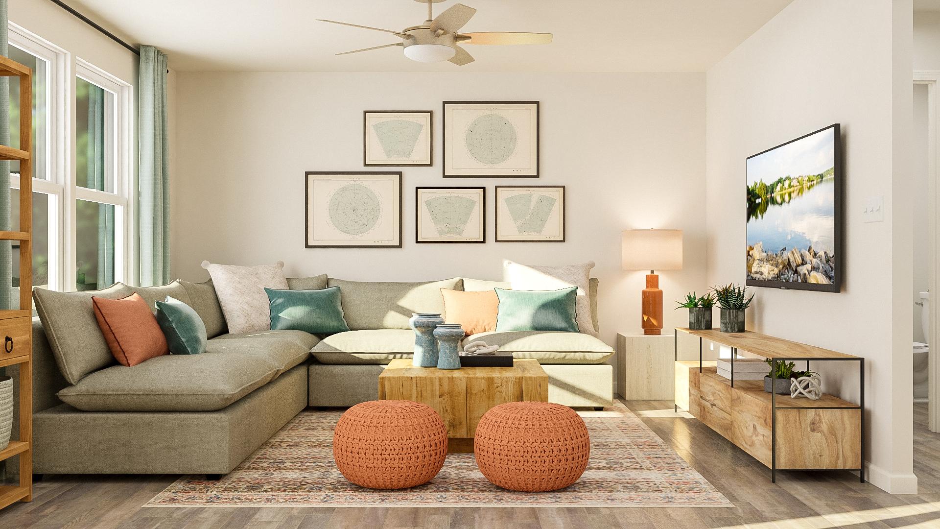 A living room with a couch and a fan.